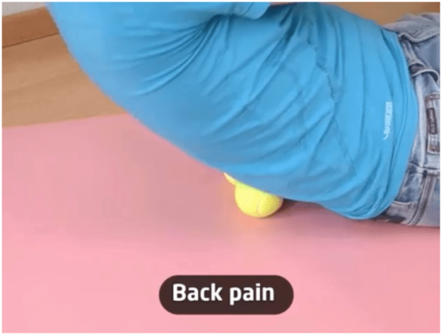 reduce back pain using tennis ball